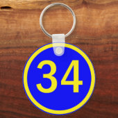 Porte-clés numéro 34 dans un cercle (Recto)