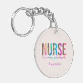 Porte-clés "Nurse - Love, Inspire, Heal" en couleur arc-en-ci (Devant gauche)