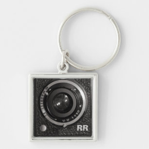 Porte-clés Objectif de caméra vintage sur un porte - clé