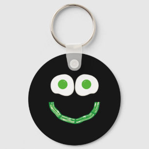 Porte-clés Œufs au visage souriant vert et petit déjeuner au