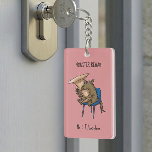 Porte-clés Œuvre d'art avec jeu de mots sur Tubacabra jouant