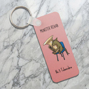 Porte-clés Œuvre d'art sur le jeu de mots Tubacabra Joueur de