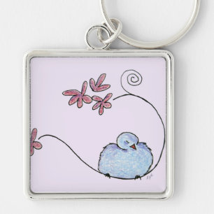 Porte-clés oiseau bleu sur une branche