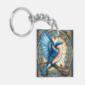 Porte-clés Oiseau bleu vif perché sur du verre tendu (Devant gauche)