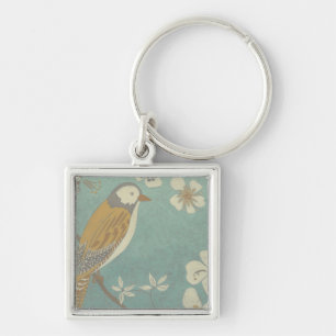 Porte-clés Oiseau jaune, gris et beige été perché sur une