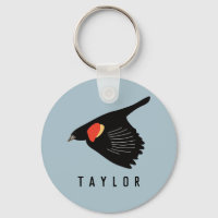 Oiseau-noir à ailes rouges personnalisées en vol