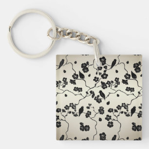 Porte-clés Oiseaux et fleurs de cerisier à motif noir sur bro
