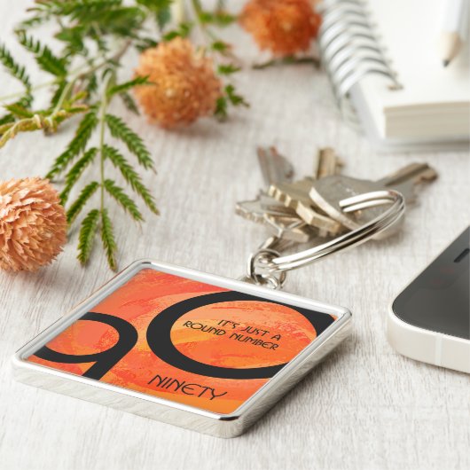 Porte-clés Orange Décennie 90e anniversaire (Côté)