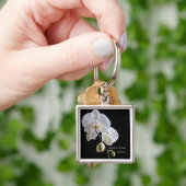 Porte-clés Orchidée blanche sur Mariage noir (main)