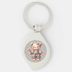 Porte-clés Ours en peluche pastel tenant une fleur et portant
