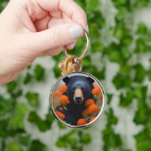 Porte-clés Ours noir en fleurs orange (Main)