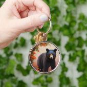 Porte-clés Ours noir en fleurs orange (Main)