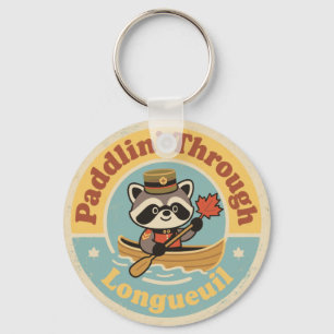 Porte-clés Pagayer à travers Longueuil avec un raton laveur a
