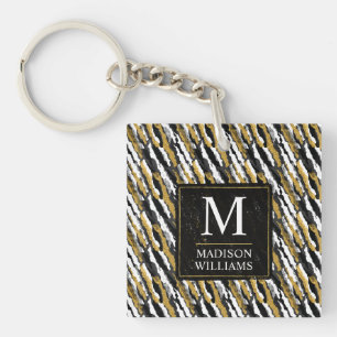 Porte-clés Paillettes noires et or Motif animal zèbre blanc