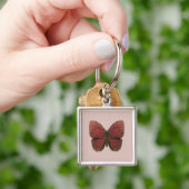 Porte-clés Papillon Coq Rouge (main)