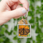 Porte-clés Papillon de monarque (plexippus de Danaus) sur le (main)