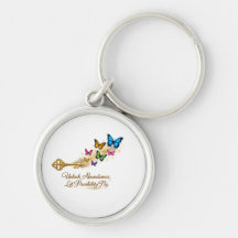 Porte-clés papillon et clé dorée inspirant