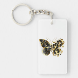 Porte-clés Papillon fleur d'or avec orchidée noire