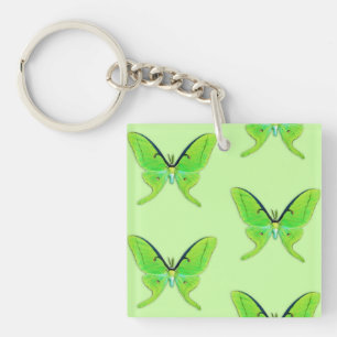 Porte-clés Papillon lune sur fond vert pâle