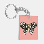 Porte-clés Papillon noir et blanc, fond rose corail (Devant gauche)
