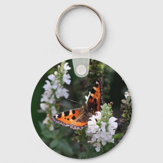 Porte-clés Papillon orange et noir sur Fleurs blanches (Recto)