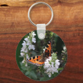 Porte-clés Papillon orange et noir sur Fleurs blanches (Recto)