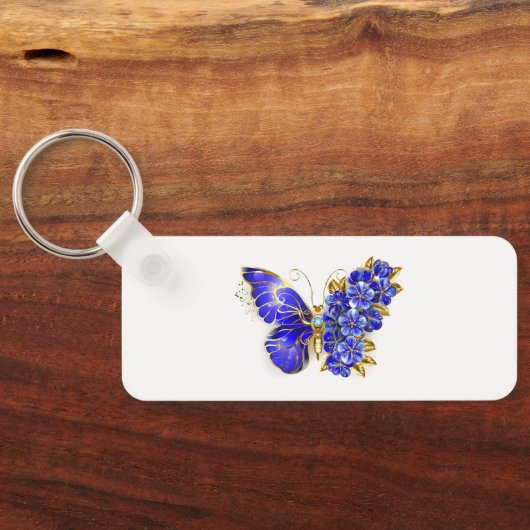 Porte-clés Papillon saphir à fleurs (Verso)