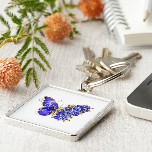Porte-clés Papillon saphir à fleurs (Côté)