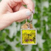 Porte-clés Papillon sur jaune (main)