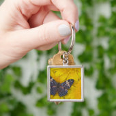 Porte-clés Papillon sur une Fleur Jaune (main)