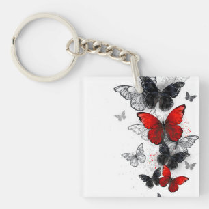 Porte-clés Papillons noirs et rouges volants