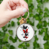 Porte-clés Papillons noirs et rouges volants (Main)