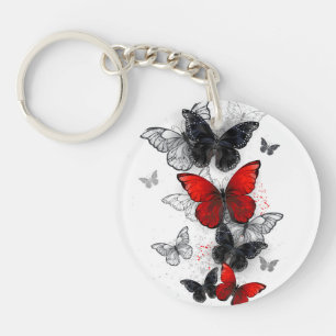 Porte-clés Papillons noirs et rouges volants