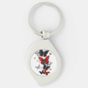 Porte-clés Papillons noirs et rouges volants