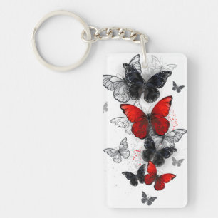 Porte-clés Papillons noirs et rouges volants