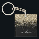 Porte-clés Parties scintillant Noir Or Script Monogramme Nom<br><div class="desc">Parties scintillant à étincelle noire et or Faux Foil Script Monogramme Nom Porte - clé. Cela rend le cadeau parfait pour 16 ans,  mariage,  douche nuptiale,  anniversaire,  baby shower ou bachelorette pour quelqu'un qui aime le luxe glam et les styles chic.</div>