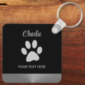 Porte-clés Paw Chien Argent sur arrière - plan noir (Verso)
