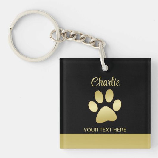 Porte-clés Paw chien brillant or sur arrière - plan noir (Devant)