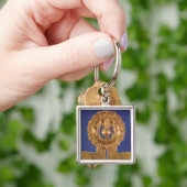 Porte-clés Pendentif représentant un disque du soleil, (main)