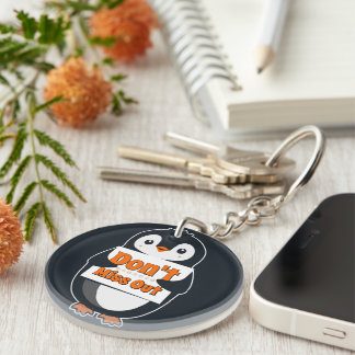 Porte-clés Penguin with Don't Miss Out Sign