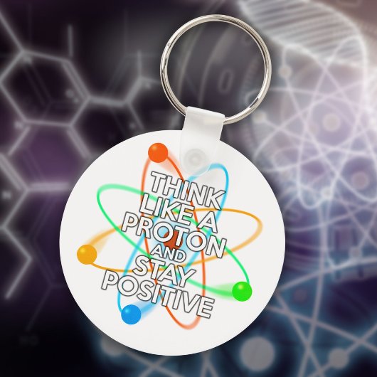 PORTE-CLÉS PENSEZ COMME UN PROTON ET RESTEZ POSITIF