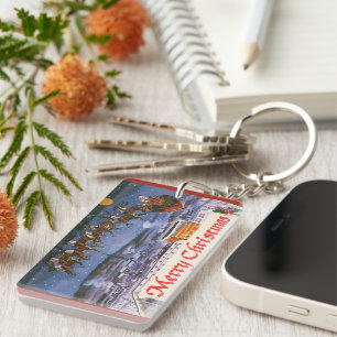 Porte-clés Père Noël de Noël vintage volant son traîneau