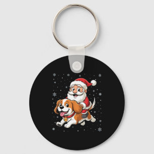 Porte-clés Père Noël montant un spaniel Cavalier King Charles