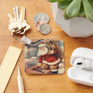 Porte-clés Père Noël victorien de Noël vintage dans une chemi
