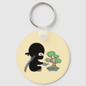 Porte-clés Petit bonsaï d'arrosage Ninja sur jaune (Recto)