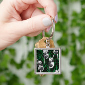 Porte-clés Petits panda sur vert foncé (main)