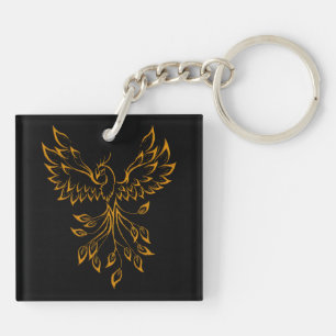 Porte-clés Phoenix de cuivre doré se lève sur fond noir