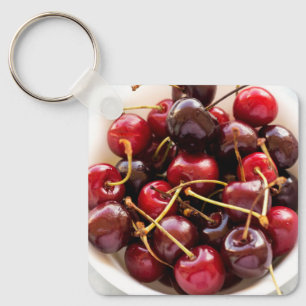 Porte-clés Photographie de cerises rouges fraîches dans un bo