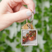 Porte-clés Plan rapproché des tomates sur un plateau (main)