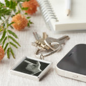 Porte-clés Pointage d'homme (Côté)